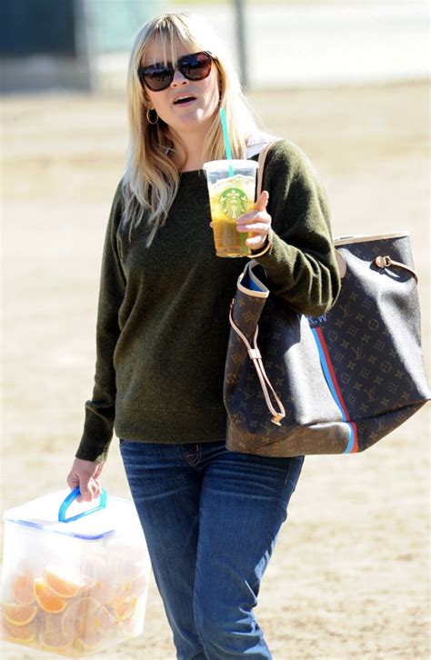 reese witherspoon louis vuitton purse|Reese Witherspoon carries orange wedges and Louis .